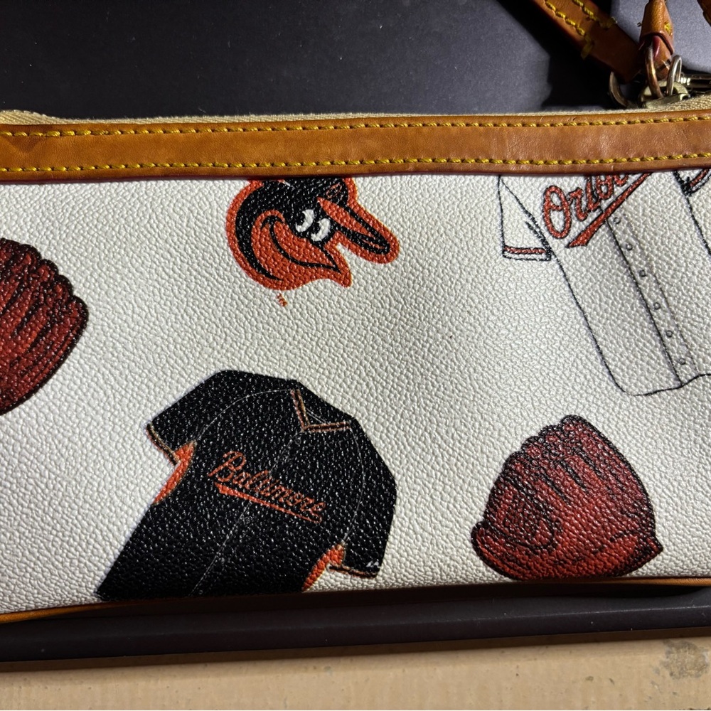 Dooney & Bourke Sports-Themed Wristlet with Black and Brown Accents - Picture 5 of 8